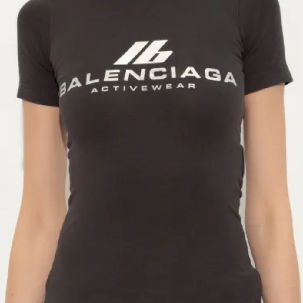 Balenciaga actiwear t-shirt fitted size L runs small. Some natural color fading.